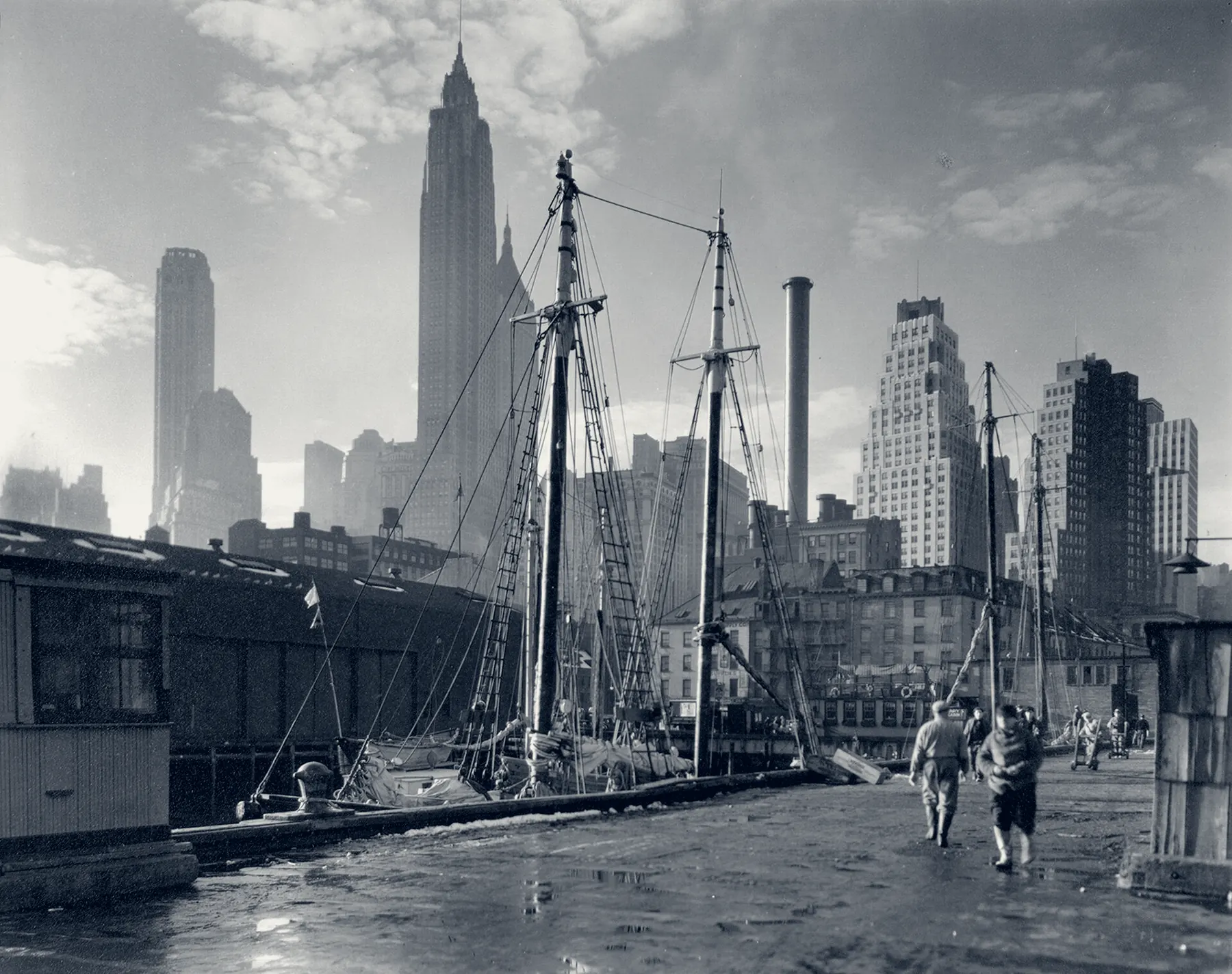 The Lower Manhattan skyline seen from the Fulton Street Dock, 1935 — archival photograph by Berenice Abbott